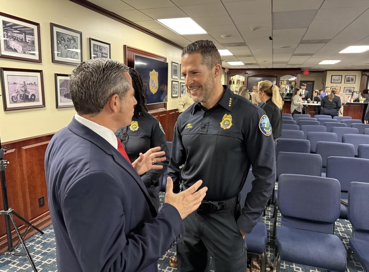 Dariel Fernandez with Police Officer
